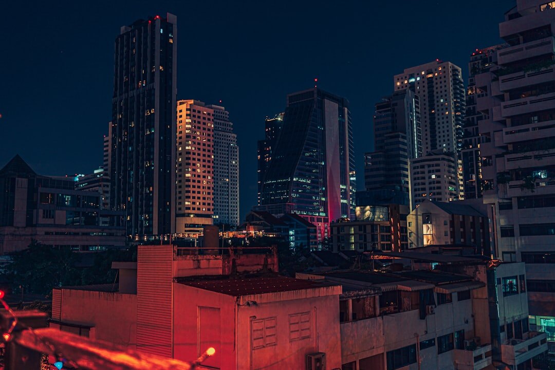 City skyline at dusk with warm lights