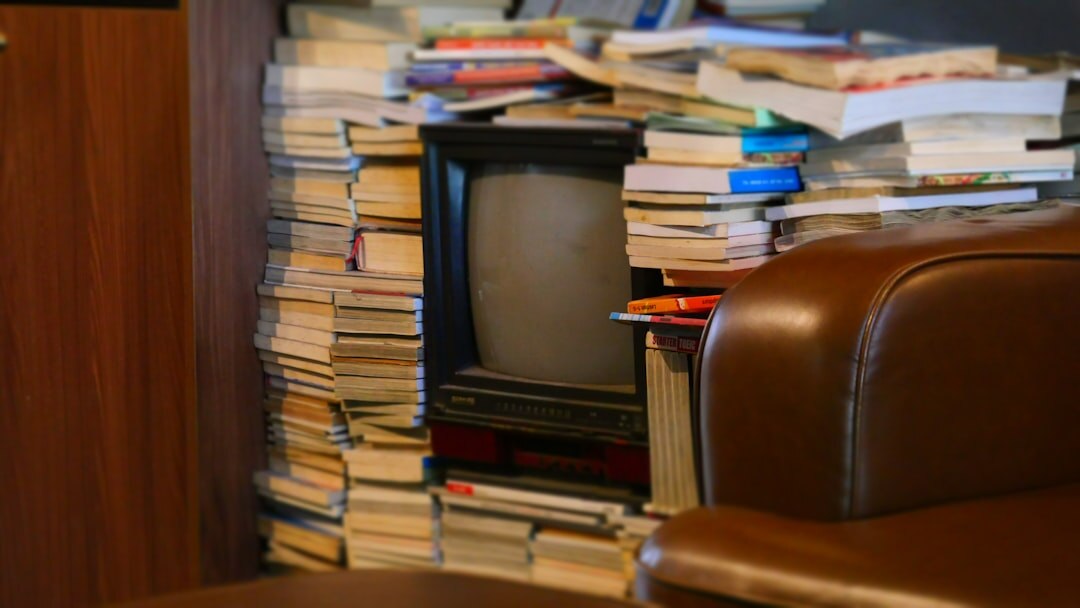 Stack of old newspapers and television programme guides